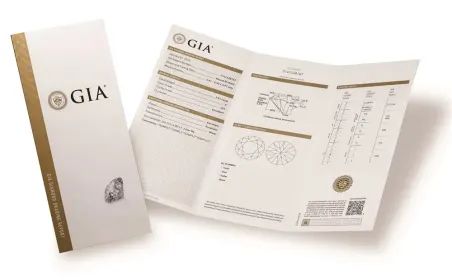 Ett officiellt GIA diamantbrev som visar certifikatets olika delar.